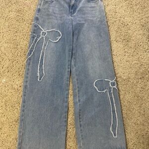 Stylish Blue Jeans with Bow Detail